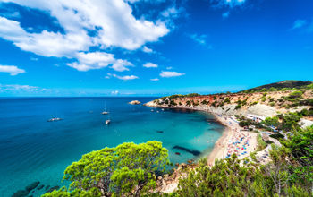 Picturesque Cala d'Hort beach. Ibiza, Balearic Islands. Spain (Photo via amoklv / iStock / Getty Images Plus)