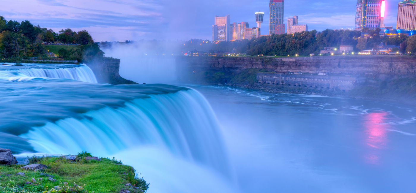 Image: PHOTO: Niagara Falls from the American side with the skyline of the city of Niagara Falls, Canada, in the background. (photo via tonda / iStock / Getty Images Plus)