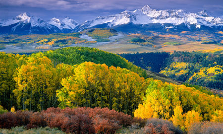 Autumn aspens and Wilson Peak in the San Miguel Range - southwestern Colorado. (Phoot via sneffelsclimber / iStock / Getty Images Plus)