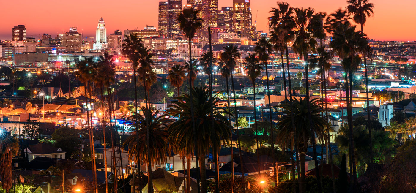 Image: Beautiful sunset behind Los Angeles' downtown skyline. (photo via choness/iStock/Getty Images Plus) (choness / iStock / Getty Images Plus)