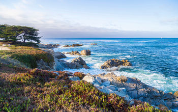 Seascape of Monterey Bay at Sunset in Pacific Grove, California, USA (Photo via Serbek / iStock / Getty Images Plus)