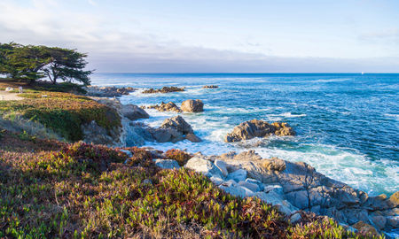 Seascape of Monterey Bay at Sunset in Pacific Grove, California, USA (Photo via Serbek / iStock / Getty Images Plus)