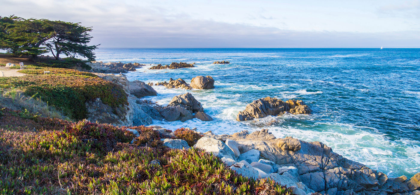 Image: Seascape of Monterey Bay at Sunset in Pacific Grove, California. (photo via Serbek / iStock / Getty Images Plus)