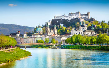 Beautiful view of Salzburg skyline with Festung Hohensalzburg and Salzach river in summer, Salzburg, Salzburger Land, Austria.