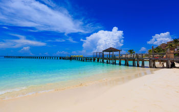 Beach in Mexico in a beautiful sunny day (Photo via cassiohabib / iStock / Getty Images Plus)