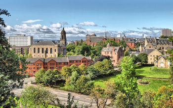 View of the city of Glasgow in Scotland (photo via claudiodivizia/iStock/Getty Images Plus)