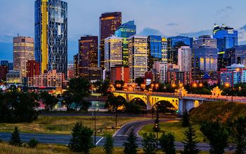 Buildings in Calgary Canada at night (Photo via  photoquest7 / iStock / Getty Images Plus)