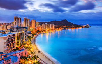 Honolulu, Hawaii. Skyline of Honolulu, Diamond Head volcano including the hotels and buildings on Waikiki Beach. (sorincolac / iStock / Getty Images Plus)