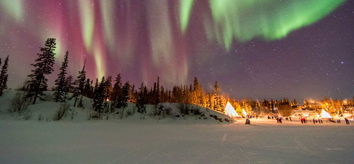 Image: PHOTO: Northern Lights in Yellowknife in Canada's Northwest Territories. (NZSteve / iStock / Getty Images Plus)