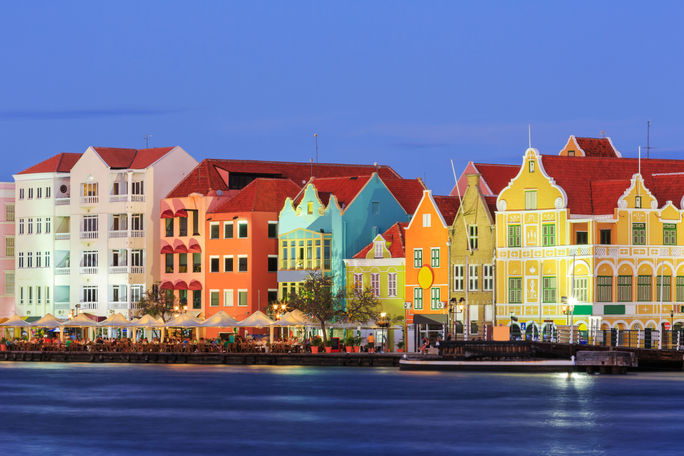 Curacao, Netherlands Antilles View of downtown Willemstad at twilight. Curacao, Netherlands Antilles (Photo via sorincolac / iStock / Getty Images Plus)