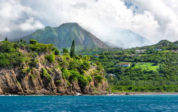 Series of eruptions of Soufriere Hills volcano between 1995 and 1999 devastated capital town Plymouth and several other villages. The zone is restricted until today, and buildings in that area are covered in volcanic flow of mud, ash, and rocks. Plymouth