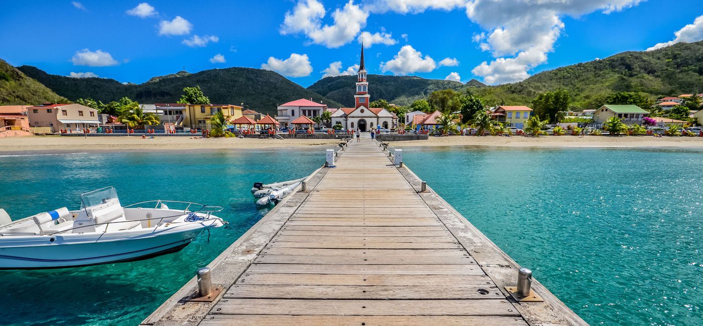 Image: PHOTO: Anse d'Arlet (photo via Damien VERRIER / iStock / Getty Images Plus)