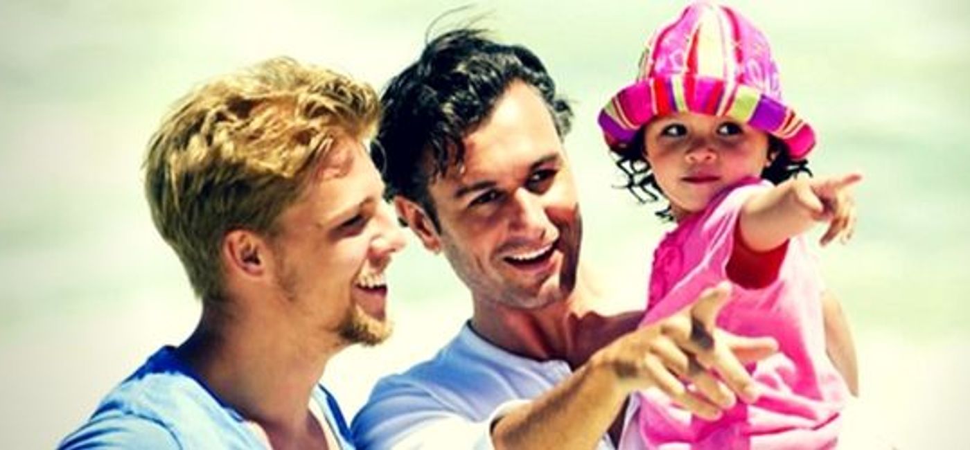 Image: PHOTO: Two men and their baby (Photo courtesy of Latin Trails)