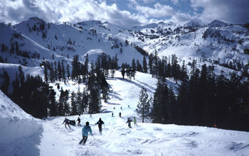 Skiers at Palisades Tahoe in California