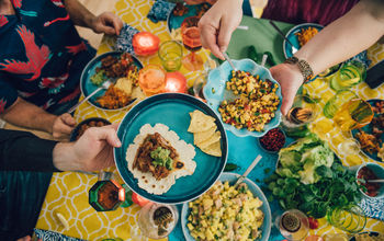 Friends sharing a Mexican meal