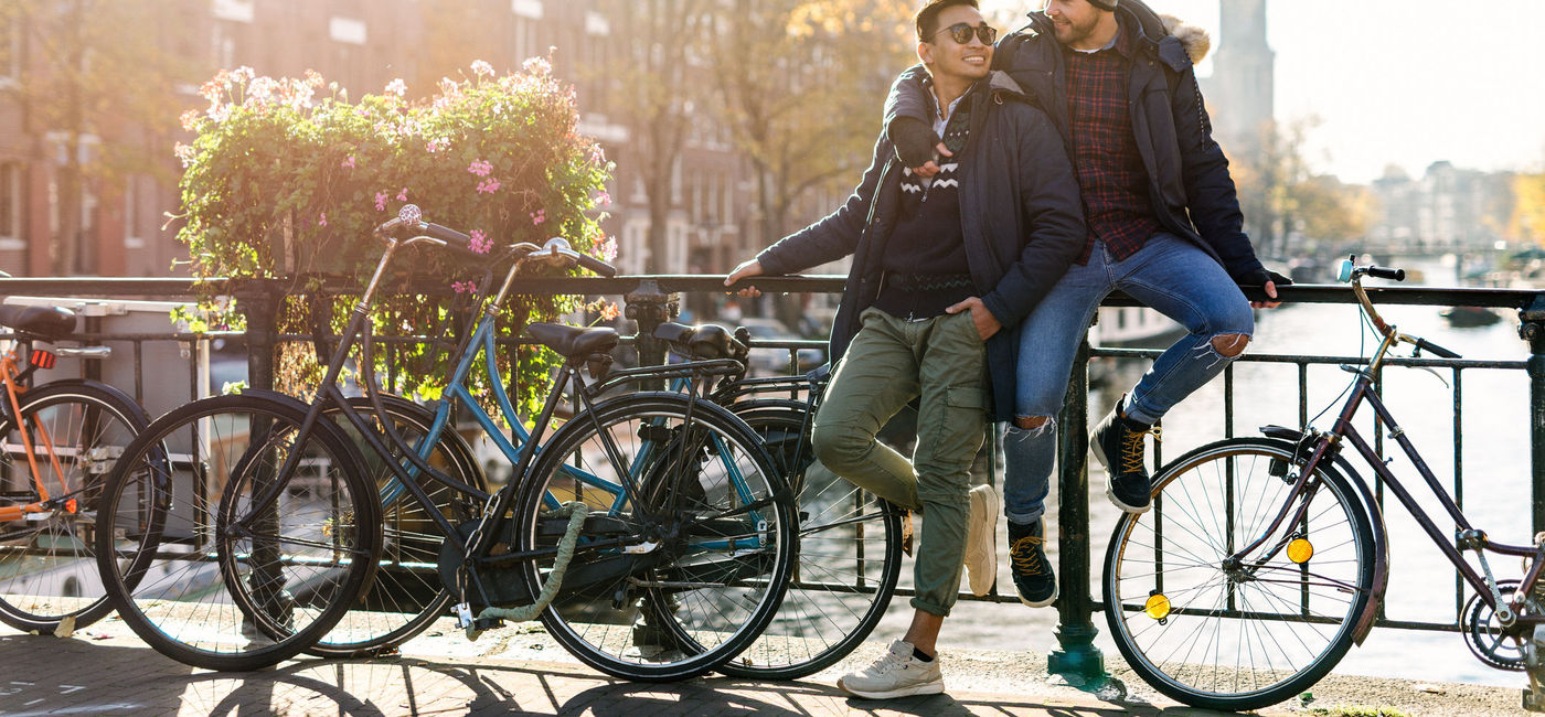 Image: A couple enjoying Amsterdam, Netherlands. (photo via Drazen_/E+)