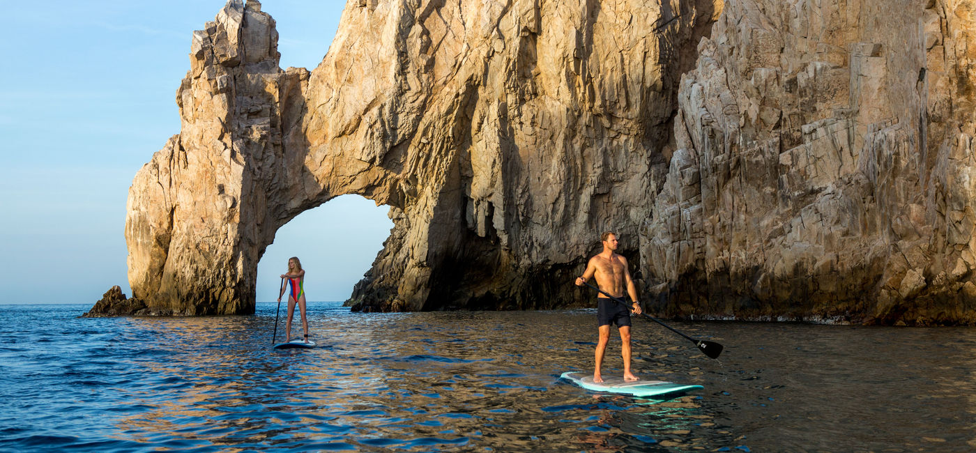 Image: Paddleboarding near the arch of Cabo San Lucas. (photo via Los Cabos)