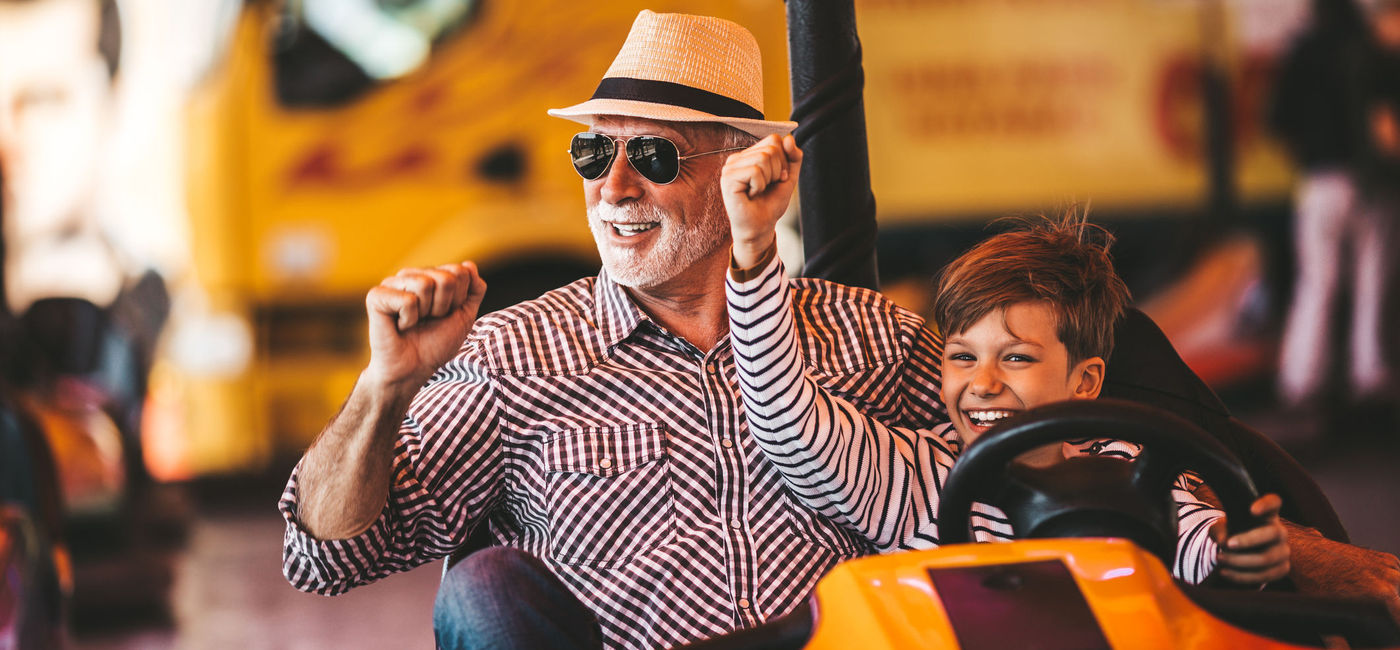 Image: Grandfather and grandson enjoy a park ride together (Photo Credit: iStock / Getty Images Plus)