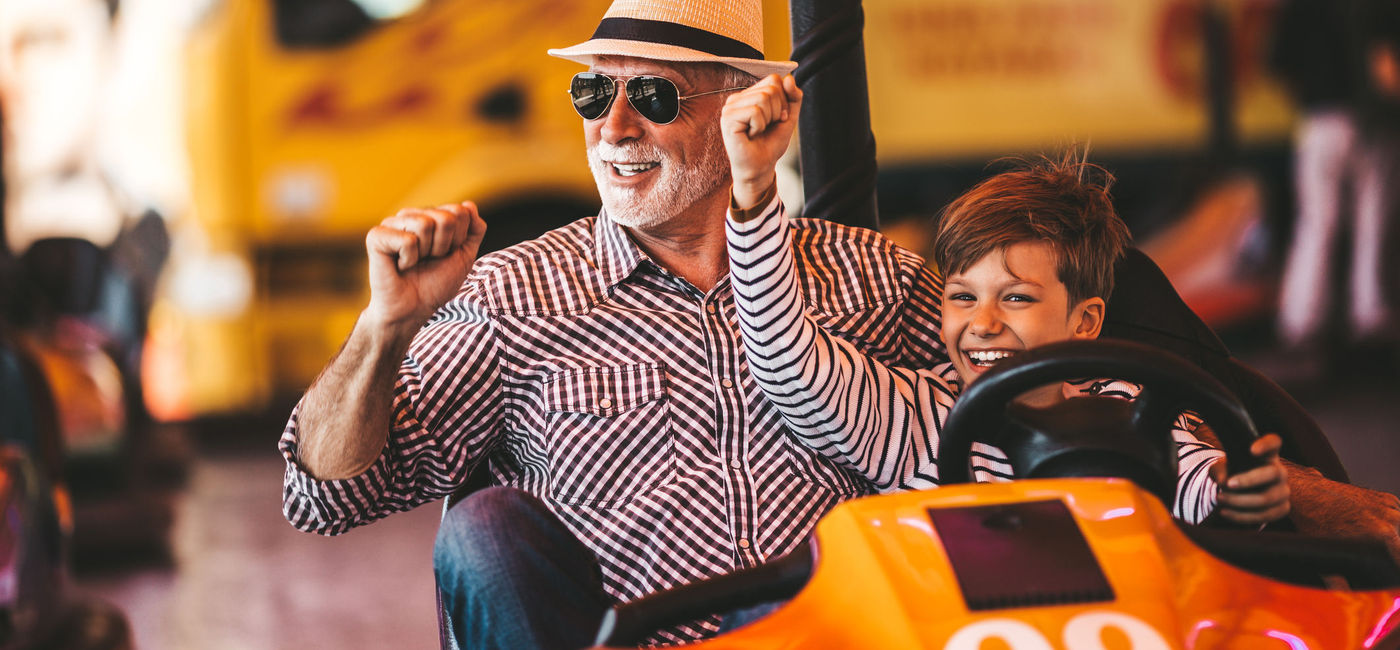 Image: Grandfather and grandson enjoy a park ride together (Photo Credit: iStock / Getty Images Plus)