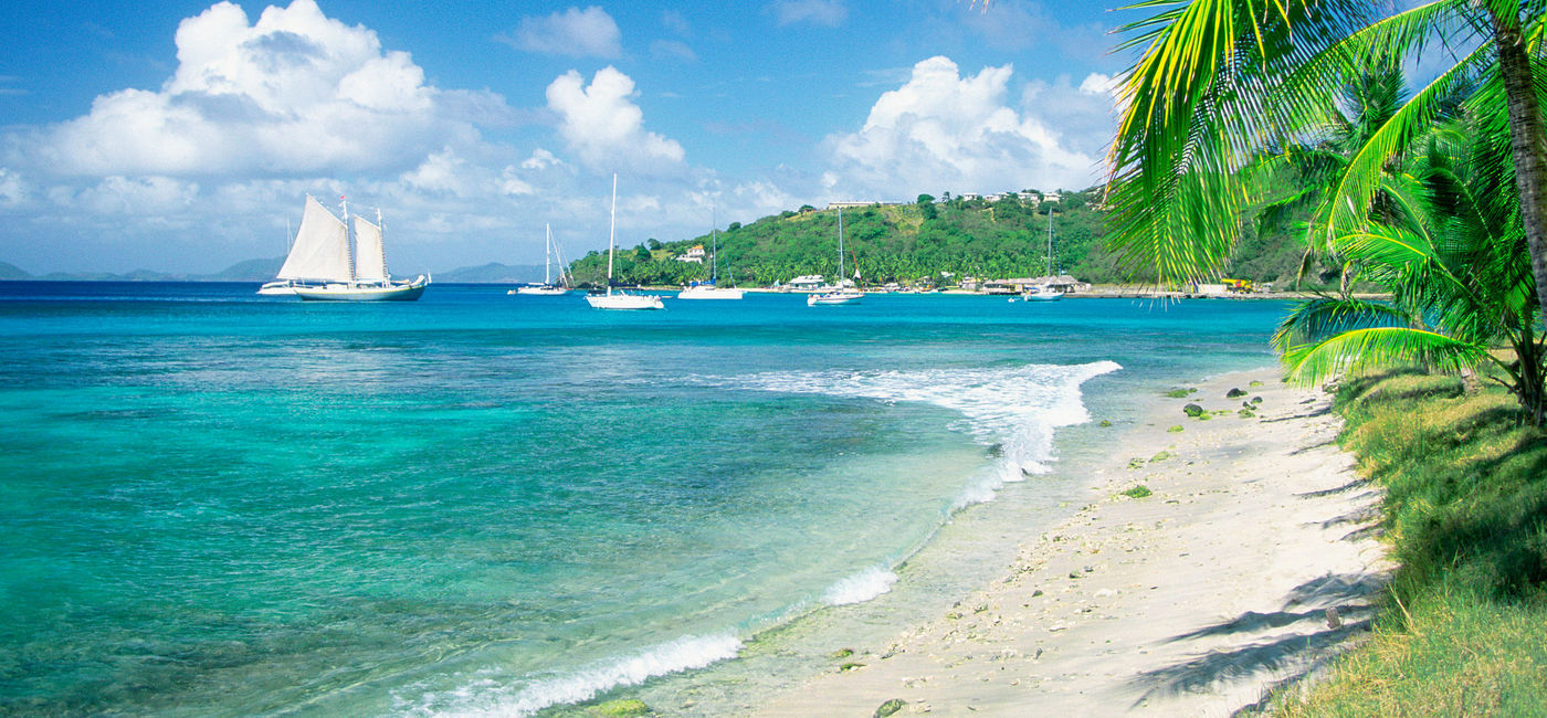 Photo: Caribbean, Grenadines, Britannia Bay, Mustique (Photo via Medioimages/Photodisc / Getty Images / Photodisc)