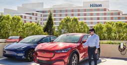 Hilton teams with Tesla.