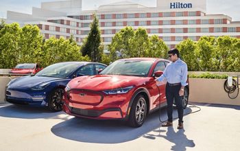 Hilton teams with Tesla.