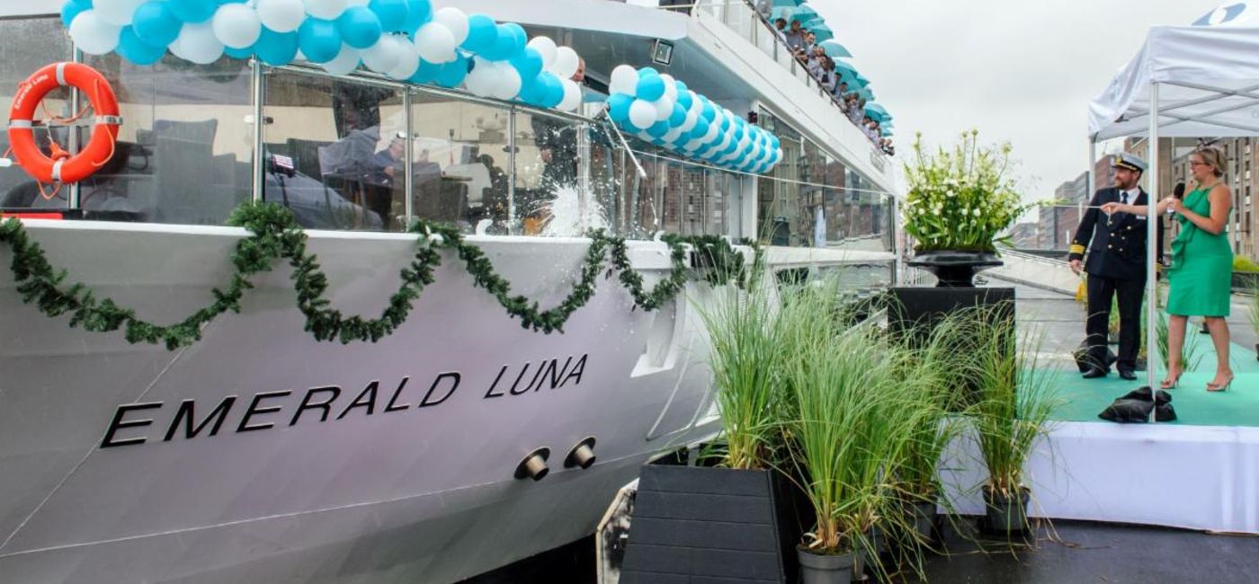 Image: Vanessa McGovern christens the Emerald Luna in Amsterdam. (Emerald Waterways)