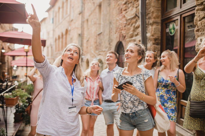 Tour of city streets with a tour guide Tour of city streets with a tour guide