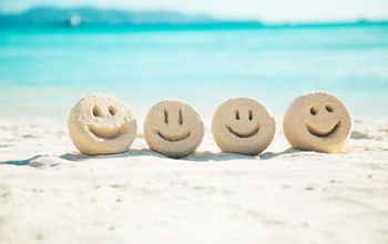 Smiley faces in the sand
