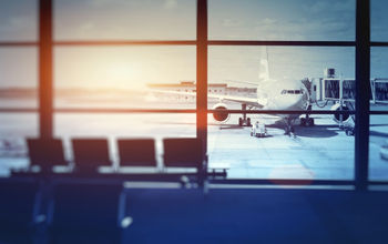 airplane waiting for departure in airport terminal