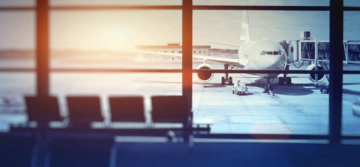 Image: PHOTO: Airplane waiting for departure in airport terminal. (Photo via anyaberkut / iStock / Getty Images Plus)