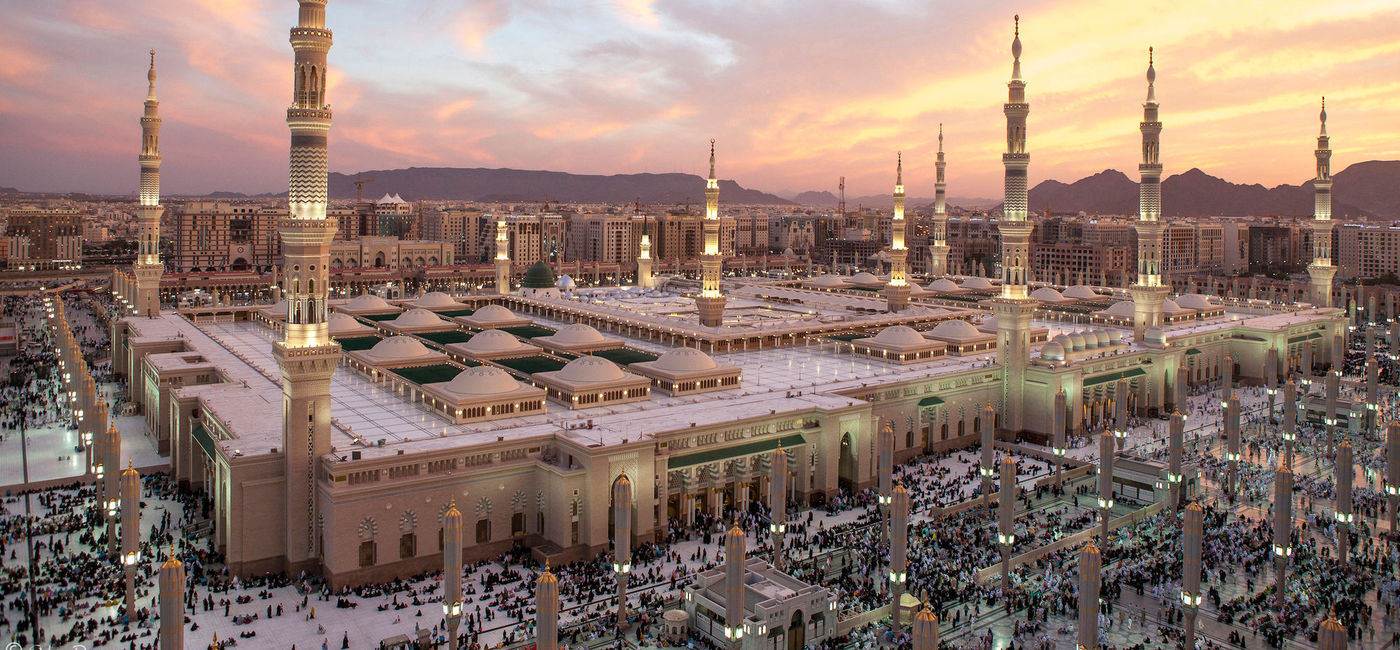 Image: Sunset at Al-Masjid Al-Nabawi, Saudi Arabia. (photo via iStock/Getty Images Plus/orhandurgut)