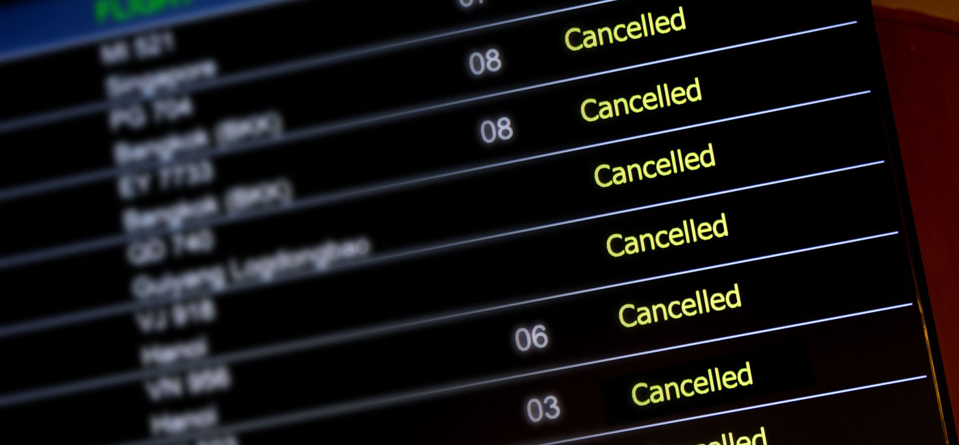 Image: Airport billboard panel with canceled flights. (photo via Delpixart / iStock / Getty Images Plus)