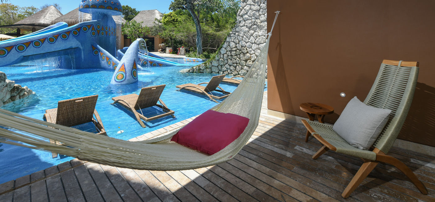 Image: PHOTO: Swim Up Garden Room at Hotel Xcaret Mexico. (photo via Hotel Xcaret Mexico)