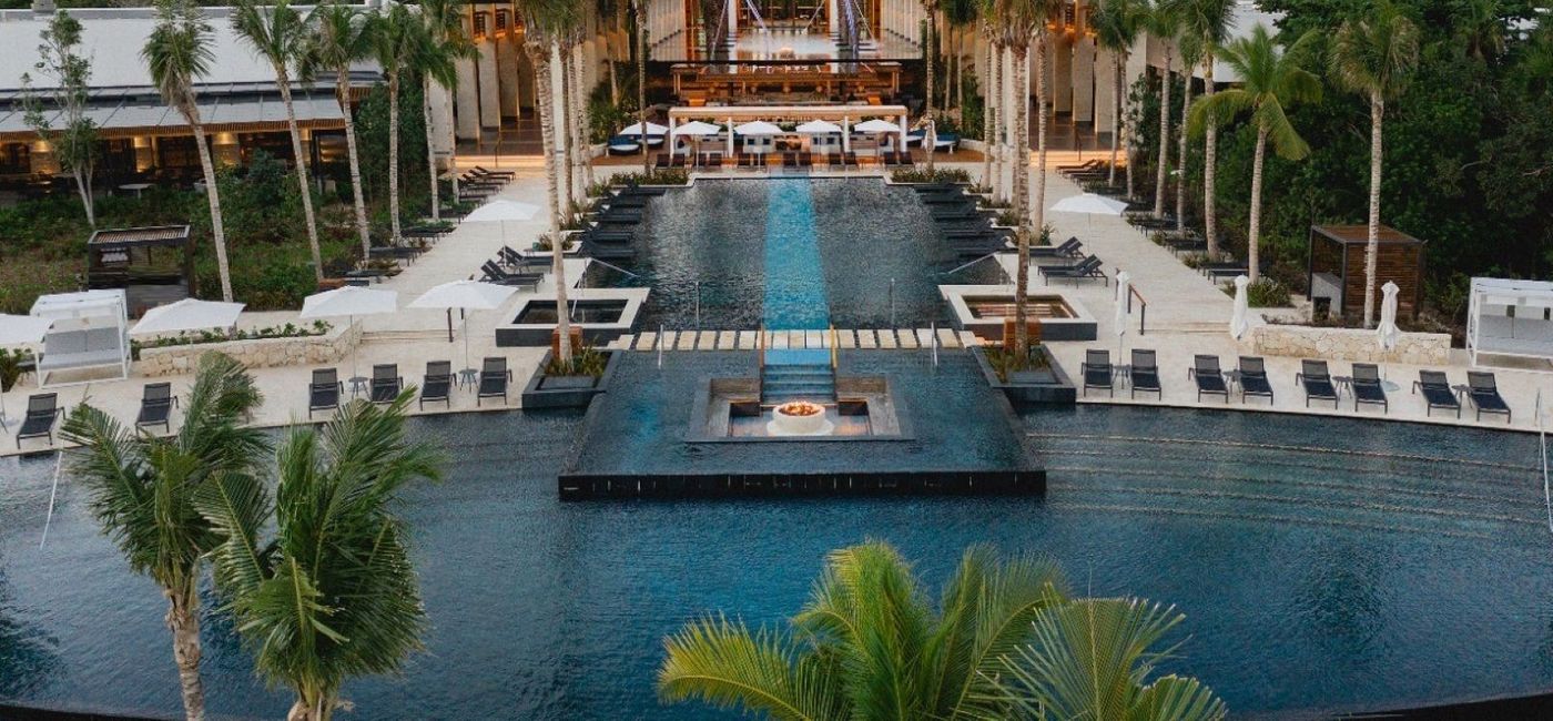 Image: Aerial view of the pool at the Conrad Tulum Riviera Maya. (photo via Conrad Tulum Riviera Maya) (Photo Credit: (photo via Conrad Tulum Riviera Maya))