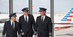 American Airlines pilots conversing at the gate
