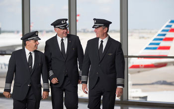 American Airlines pilots conversing at the gate