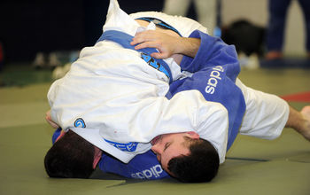 Two athletes competing in Judo 