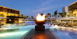TRS Coral Hotel, swimming pool, dusk, Costa Mujeres, Mexico, Wyndham Hotels & Resorts, Palladium Hotel Group, Registry Collection Hotels 