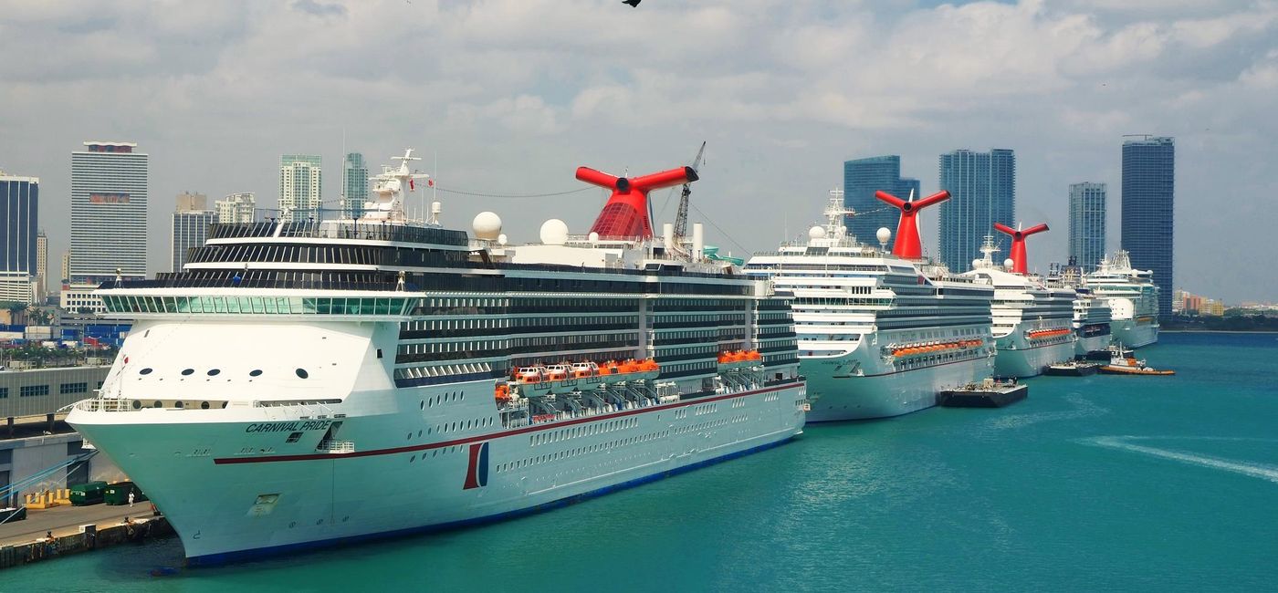 Image: PHOTO: Carnival Cruise Line ships docked at PortMiami. (photo via photosvit/iStock Editorial/Getty Images Plus)