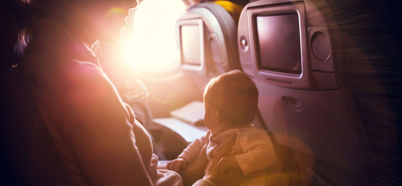 Image: Flying with baby onboard. (Photo via iStock / Getty Images / RyanJLane)
