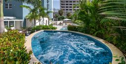 The pool at the Condado Palm Inn San Juan, Tapestry Collection by Hilton