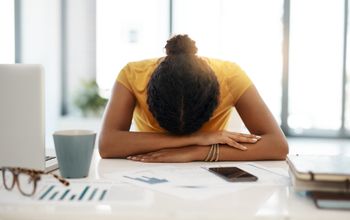 Woman stressed out at work