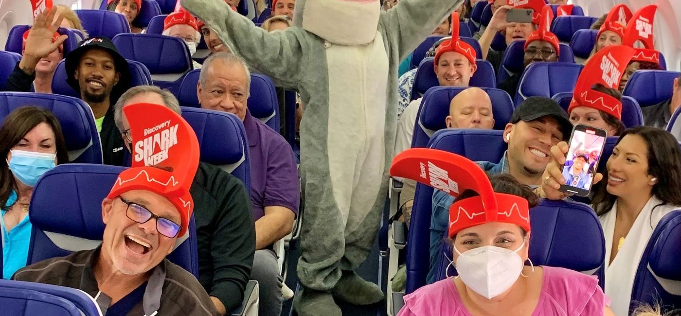 Image: Shark Week mascot Chompie on a Southwest Flight. (photo via Southwest Airlines Media)