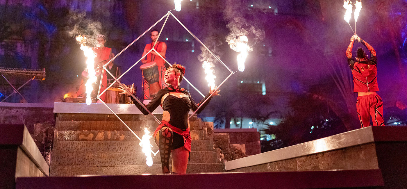 Image: A fire performance at The Atrium. (photo via Oasis Hotels & Resorts) ((photo via Oasis Hotels & Resorts))