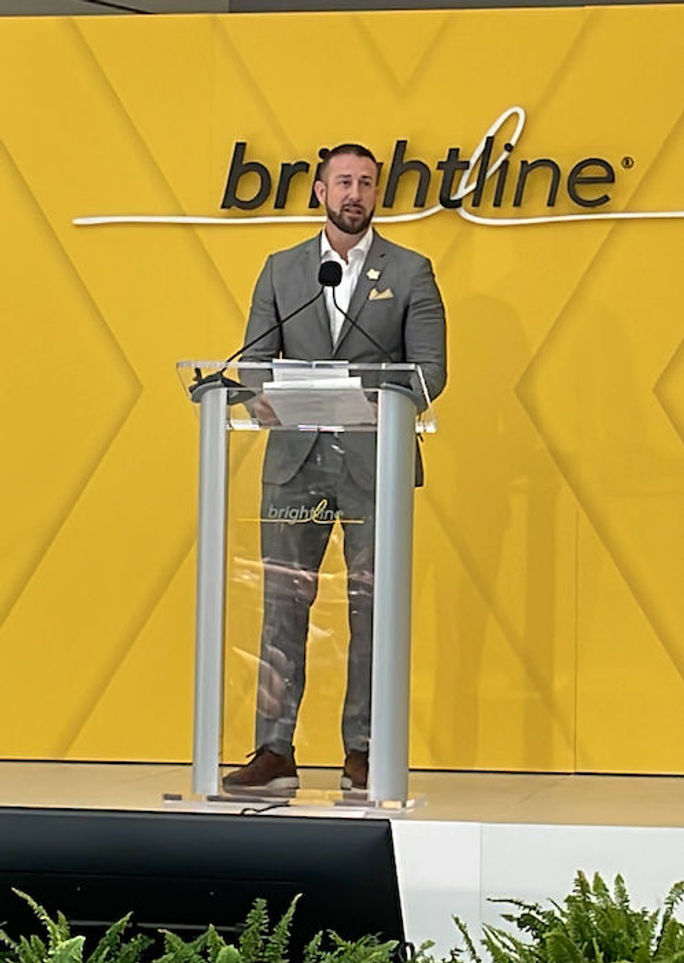 Brightline President Patrick Goddard speaks at the Brightline Orlando Station unveiling. 
