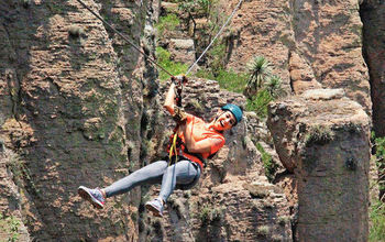 In the Boca de Tunel canyon system, visitors practice adventure tourism