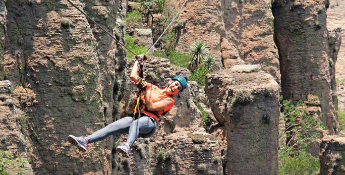 In the Boca de Tunel canyon system, visitors practice adventure tourism In the Boca de Tunel canyon system, visitors practice adventure tourism