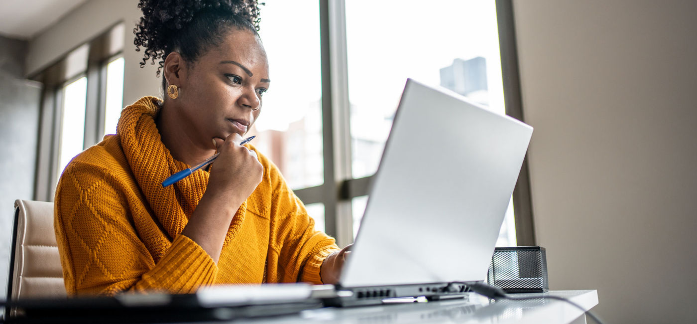 Image: Travel advisor working from the home office. (Photo Credit: Drs Producoes/E+)
