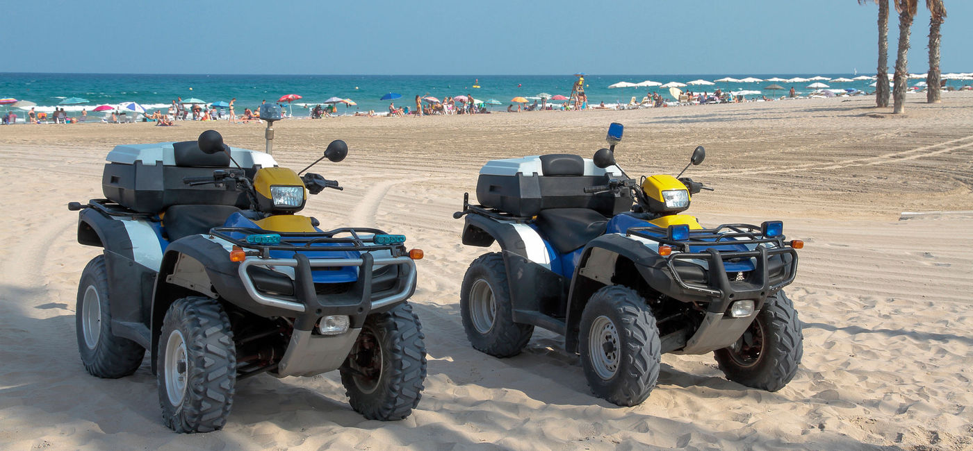 Image: Police quads on the beach. (photo via kake1967 / iStock / Getty Images Plus)